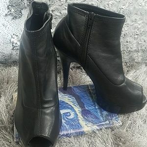 Platform pleather peep toe heels. Sexy!